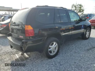 2006 GMC Envoy SLE z VIN 1GKDS13S062176000, wystawiony jako Copart lot #57672995 z przebiegiem 161 455 mil mil oraz Szkoda całkowita • Salvage title. Historia ofert i sprzedaży dostępna na DreamBid. Obrazek 3.