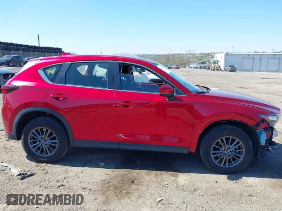2019 Mazda CX-5 Sport with VIN JM3KFBBM6K1596402, listed as a IAAI auction lot 41971766 with 60,396 mi miles and . Bid and sale history available at DreamBid. Image 14.