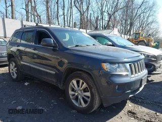 2013 Jeep Grand Cherokee Laredo with VIN 1C4RJFAG4DC653079, listed as a IAAI auction lot 41726726 with 152,356 mi miles. Bid and sale history available at carsss.com. Image 1.