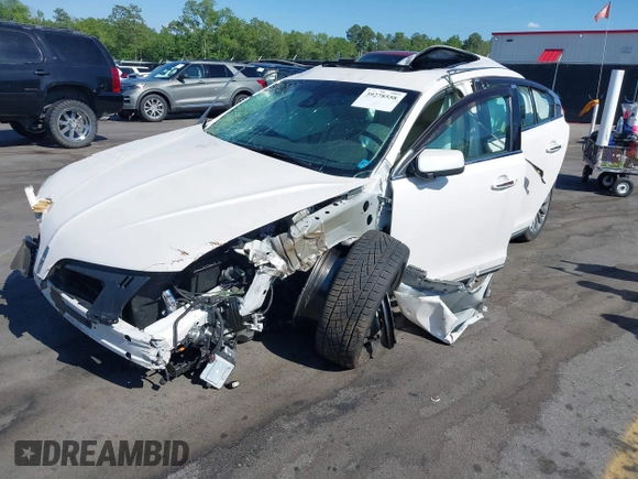 2014 Lincoln MKS with VIN 1LNHL9DK2EG612009, listed as a IAAI auction lot 39278558 with 56,893 mi miles. Bid and sale history available at carsss.com. Image 2.
