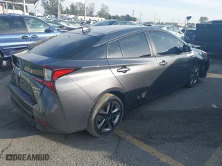 2022 Toyota Prius L Eco with VIN JTDKAMFU2N3168011, listed as a IAAI auction lot 41602356 with 34,977 mi miles. Bid and sale history available at carsss.com. Image 4.