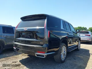 2023 Cadillac Escalade 4WD Premium Luxury with VIN 1GYS4BKL0PR409325, listed as a IAAI auction lot 41973567 with 32,398 mi miles. Bid and sale history available at carsss.com. Image 4.