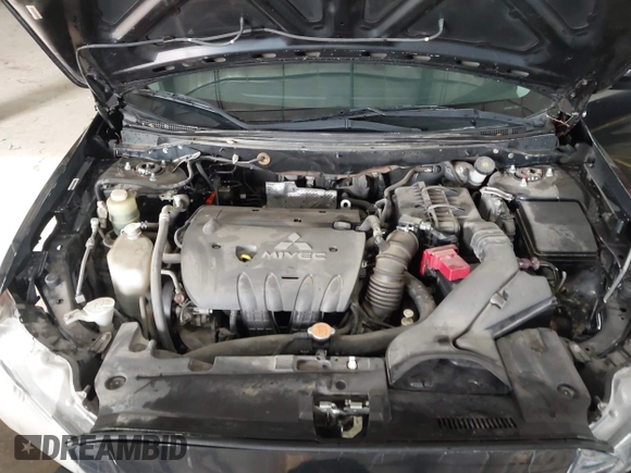 2008 Mitsubishi Lancer DE with VIN JA3AU26UX8U015865, listed as a IAAI auction lot 41108329 with 131,884 mi miles. Bid and sale history available at carsss.com. Image 10.