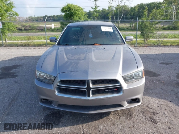 2014 Dodge Charger SE with VIN 2C3CDXBGXEH284832, listed as a IAAI auction lot 42069294 with 186,273 mi miles and . Bid and sale history available at carsss.com. Image 12.