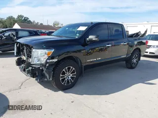 2020 Nissan Titan Platinum Reserve with VIN 1N6AA1EF0LN507232, listed as a IAAI auction lot 41432976 with 88,203 mi miles and . Bid and sale history available at DreamBid. Image 2.