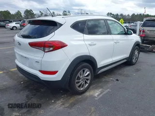 2017 Hyundai Tucson SE with VIN KM8J3CA44HU511581, listed as a IAAI auction lot 41687971 with 111,981 mi miles. Bid and sale history available at carsss.com. Image 4.