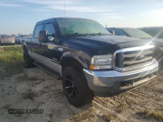 2003 Ford F-350 with VIN 1FTSW30PX3EC59706, listed as a Copart auction lot 74680424 with 155,093 mi miles and Salvage title. Bid and sale history available at DreamBid. Image 4.