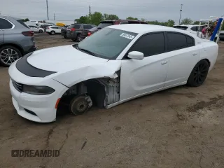 2015 Dodge Charger SE z VIN 2C3CDXBGXFH867211, wystawiony jako Copart lot #56847345 z przebiegiem 170 495 mil mil oraz Czysty tytuł • Clean title. Historia ofert i sprzedaży dostępna na DreamBid. Obrazek 1.