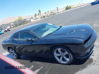 2015 Dodge Challenger R/T with VIN 2C3CDZAT3FH707200, listed as a IAAI auction lot 42154182 with 93,868 mi miles and . Bid and sale history available at DreamBid. Image 13.