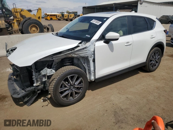 2018 Mazda CX-5 Touring with VIN JM3KFBCM0J0431285, listed as a Copart auction lot 53919695 with 61,745 mi miles and Salvage Title. Bid and sale history available at carsss.com. Image 1.