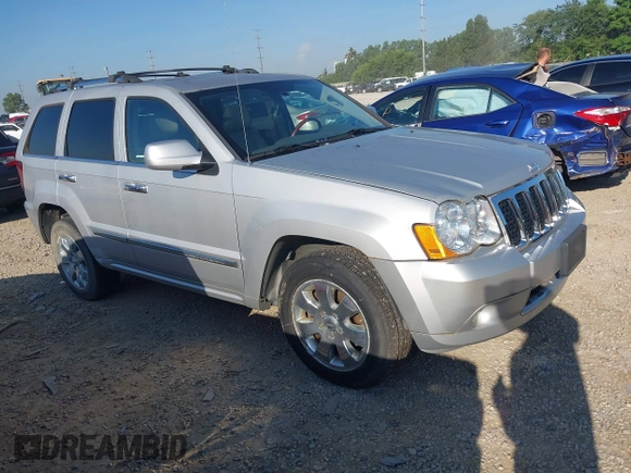 2008 Jeep Grand Cherokee Overland with VIN 1J8HR68M68C242958, listed as a IAAI auction lot 42820206 with 214,472 mi miles and . Bid and sale history available at DreamBid. Image 1.