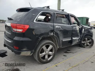 2012 Jeep Grand Cherokee Overland with VIN 1C4RJECT7CC311578, listed as a Copart auction lot 51905715 with 172,980 mi miles and Salvage Title. Bid and sale history available at carsss.com. Image 3.