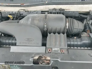 2005 Ford Econoline Cargo with VIN 1FTRE14W45HA28566, listed as a IAAI auction lot 42875904 with 216,247 mi miles and . Bid and sale history available at DreamBid. Image 15.