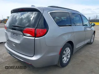2017 Chrysler Pacifica Touring L with VIN 2C4RC1BG1HR803027, listed as a IAAI auction lot 41896775 with 112,896 mi miles and . Bid and sale history available at DreamBid. Image 4.