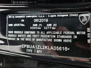 2019 Lamborghini Urus z VIN ZPBUA1ZL2KLA05616, wystawiony jako Copart lot #76865444 z przebiegiem 67 830 mil mil oraz Nie do naprawy. Historia ofert i sprzedaży dostępna na DreamBid. Obrazek 14.