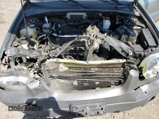 2006 Ford Escape XLS z VIN 1FMYU02Z36KB10195, wystawiony jako Copart lot #53108415 z przebiegiem Nie podano mil oraz Szkoda całkowita • Salvage title. Historia ofert i sprzedaży dostępna na DreamBid. Obrazek 14.