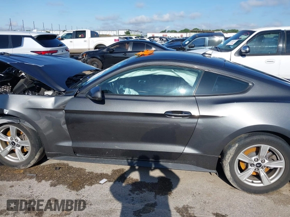 2020 Ford Mustang EcoBoost with VIN 1FA6P8TH3L5169920, listed as a IAAI auction lot 42339107 with 84,748 mi miles and . Bid and sale history available at DreamBid. Image 14.
