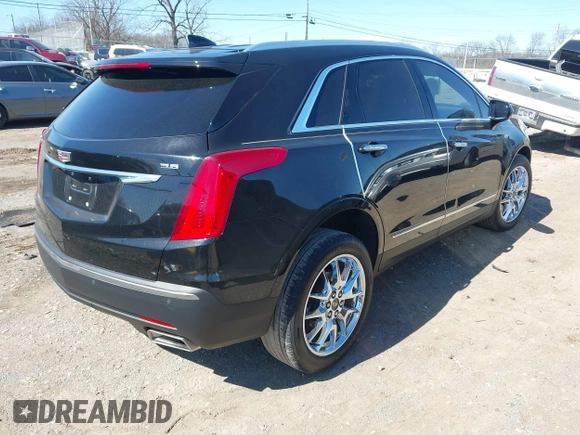 2017 Cadillac XT5 Premium Luxury FWD z VIN 1GYKNCRS8HZ127001, wystawiony jako IAAI lot #41698197 z przebiegiem 120 978 mil mil oraz . Historia ofert i sprzedaży dostępna na DreamBid. Obrazek 4.