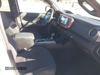 2016 Toyota Tacoma SR5 z VIN 3TMAZ5CN5GM014661, wystawiony jako IAAI lot #41337963 z przebiegiem 26 175 mil mil oraz . Historia ofert i sprzedaży dostępna na DreamBid. Obrazek 5.