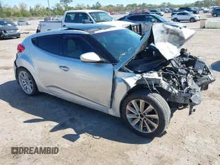 2012 Hyundai Veloster w/Black Int z VIN KMHTC6ADXCU036070, wystawiony jako IAAI lot #41779990 z przebiegiem Nie podano mil oraz . Historia ofert i sprzedaży dostępna na DreamBid. Obrazek 1.