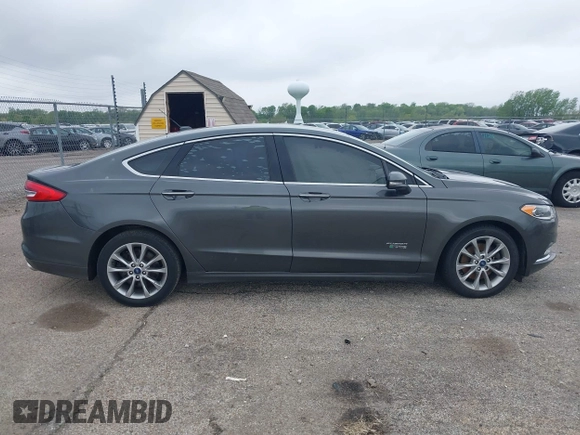 2017 Ford Fusion Energi SE with VIN 3FA6P0PU9HR227932, listed as a IAAI auction lot 42177500 with 106,938 mi miles. Bid and sale history available at carsss.com. Image 13.
