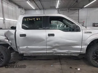 2015 Ford F-150 XLT with VIN 1FTEW1E89FFA44710, listed as a IAAI auction lot 41521584 with 158,297 mi miles. Bid and sale history available at carsss.com. Image 14.