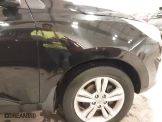 2013 Hyundai Tucson GLS with VIN KM8JU3AC0DU754948, listed as a IAAI auction lot 41811891 with 139,056 mi miles. Bid and sale history available at carsss.com. Image 18.
