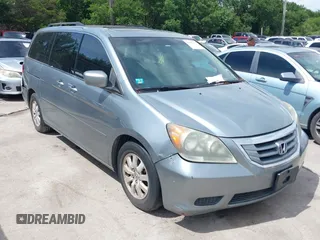 2008 Honda Odyssey EX-L z VIN 5FNRL38798B033741, wystawiony jako IAAI lot #42487377 z przebiegiem 184 311 mil mil oraz . Historia ofert i sprzedaży dostępna na DreamBid. Obrazek 1.