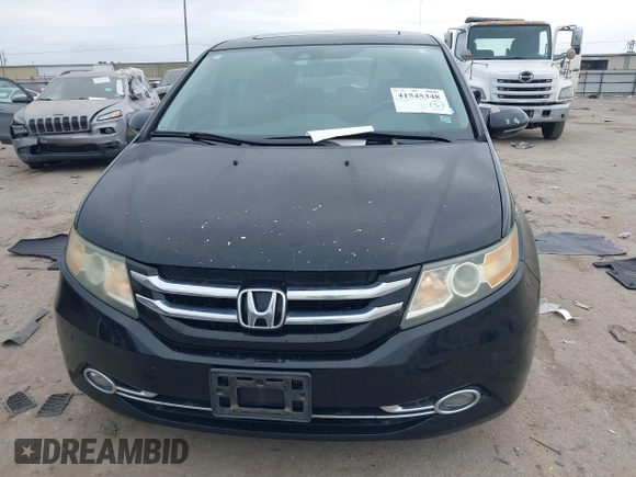 2014 Honda Odyssey Touring with VIN 5FNRL5H9XEB045695, listed as a IAAI auction lot 41545348 with 131,472 mi miles and . Bid and sale history available at carsss.com. Image 12.