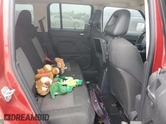 2009 Jeep Patriot Sport z VIN 1J4FT28A49D122175, wystawiony jako Copart lot #51518055 z przebiegiem 127 815 mil mil oraz Szkoda całkowita • Salvage title. Historia ofert i sprzedaży dostępna na DreamBid. Obrazek 12.