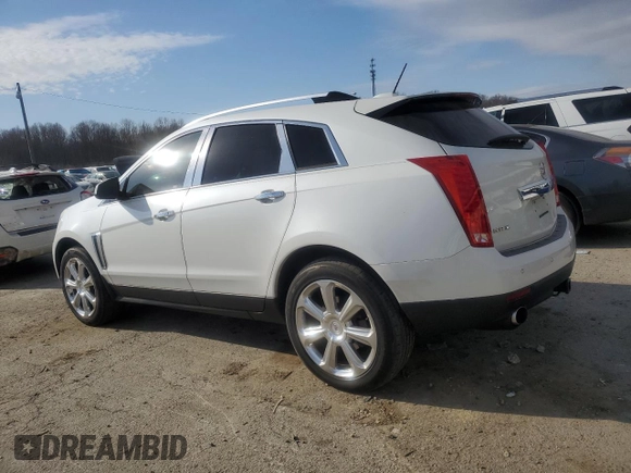 2015 Cadillac SRX Premium Collection with VIN 3GYFNDE39FS623425, listed as a Copart auction lot 47740135 with 133,838 mi miles and Salvage title. Bid and sale history available at DreamBid. Image 2.