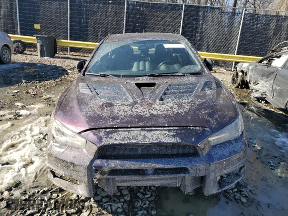 2014 Mitsubishi Lancer Evolution GSR z VIN JA32W8FV6EU010233, wystawiony jako Copart lot #42787275 z przebiegiem 74 780 mil mil oraz Szkody całkowita. Historia ofert i sprzedaży dostępna na DreamBid. Obrazek 5.