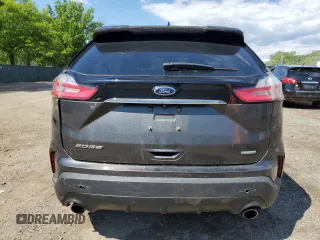 2019 Ford Edge SE with VIN 2FMPK3G93KBC38114, listed as a Copart auction lot 57638015 with 131,771 mi miles and Salvage title. Bid and sale history available at DreamBid. Image 6.