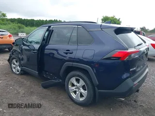 2019 Toyota RAV4 XLE with VIN 2T3P1RFVXKC057616, listed as a IAAI auction lot 42685158 with 148,661 mi miles and . Bid and sale history available at DreamBid. Image 3.