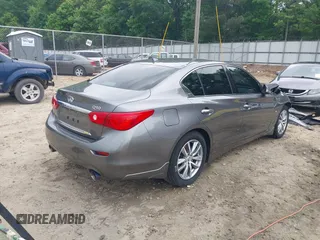 2015 Infiniti Q50 Premium with VIN JN1BV7AP7FM338434, listed as a IAAI auction lot 42158445 with 115,685 mi miles and . Bid and sale history available at DreamBid. Image 4.