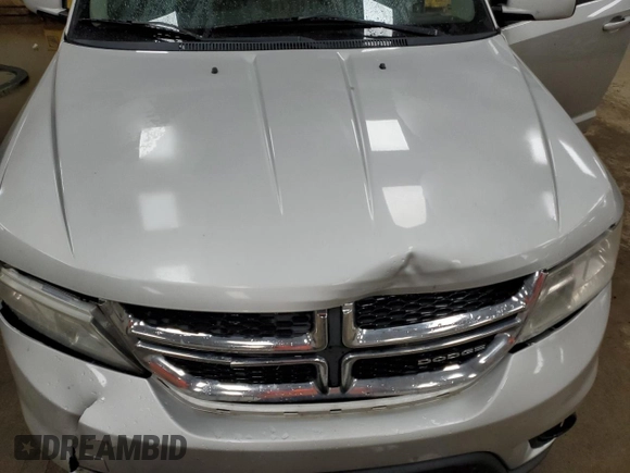 2012 Dodge Journey SXT с VIN 3C4PDCCG4CT133946, выставлен на аукционе Copart как лот 77002184 с пробегом 118 985 миль миль и Чистый • Clean title. История ставок и продаж доступна на DreamBid. Изображение 12.
