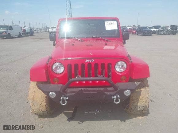 2012 Jeep Wrangler Unlimited Sahara with VIN 1C4HJWEGXCL209449, listed as a IAAI auction lot 41864432 with 100,917 mi miles. Bid and sale history available at carsss.com. Image 12.