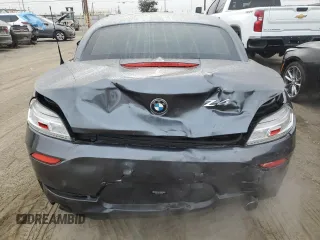 2014 BMW Z4 sDrive35i with VIN WBALM7C50EE385780, listed as a Copart auction lot 82884414 with 88,765 mi miles and Salvage Title. Bid and sale history available at carsss.com. Image 6.