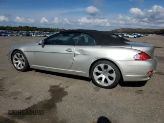 2007 BMW 6 Series 650i with VIN WBAEK13507CN84404, listed as a Copart auction lot 73525244 with 156,497 mi miles and Salvage Title. Bid and sale history available at carsss.com. Image 2.