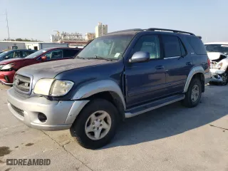 2001 Toyota Sequoia SR5 with VIN 5TDZT34A41S056833, listed as a Copart auction lot 76340884 with 232,809 mi miles and Salvage Title. Bid and sale history available at carsss.com. Image 1.