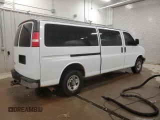 2014 Chevrolet Express Passenger LT with VIN 1GAZG1FG4E1176590, listed as a Copart auction lot 83660024 with 167,653 mi miles and Salvage title. Bid and sale history available at DreamBid. Image 3.