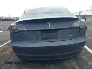 2022 Tesla Model 3 Long Range with VIN 5YJ3E1EB9NF206943, listed as a IAAI auction lot 41911040 with 69,920 mi miles and . Bid and sale history available at DreamBid. Image 16.