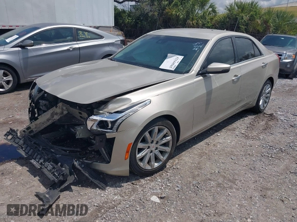 2014 Cadillac CTS Luxury RWD z VIN 1G6AR5SX4E0141195, wystawiony jako IAAI lot #42144565 z przebiegiem 80 267 mil mil oraz . Historia ofert i sprzedaży dostępna na DreamBid. Obrazek 16.