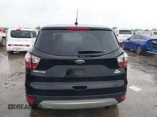 2017 Ford Escape SE with VIN 1FMCU0GD4HUE93661, listed as a IAAI auction lot 41877372 with 63,778 mi miles. Bid and sale history available at carsss.com. Image 16.