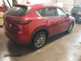 2020 Mazda CX-5 Grand Touring with VIN JM3KFBDMXL0840847, listed as a IAAI auction lot 41732185 with 36,248 mi miles. Bid and sale history available at carsss.com. Image 4.