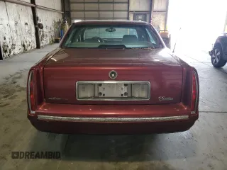 1998 Cadillac DeVille z VIN 1G6KD54Y3WU754718, wystawiony jako Copart lot #60068175 z przebiegiem 64 498 mil mil oraz Czysty tytuł • Clean title. Historia ofert i sprzedaży dostępna na DreamBid. Obrazek 6.