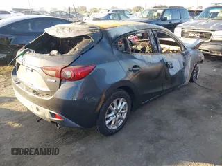 2015 Mazda 3 i Touring with VIN 3MZBM1L73FM145693, listed as a IAAI auction lot 41236304 with Not Provided miles and . Bid and sale history available at carsss.com. Image 4.