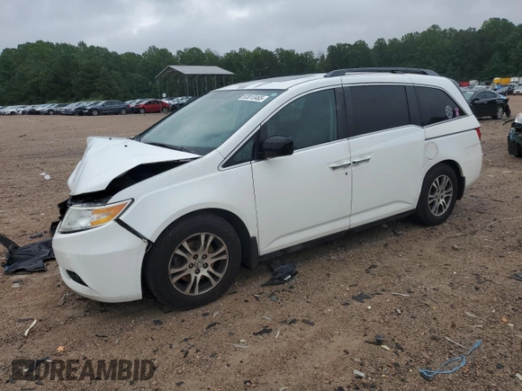 2013 Honda Odyssey EX-L with VIN 5FNRL5H62DB048370, listed as a Copart auction lot 63013465 with 129,552 mi miles and Salvage title. Bid and sale history available at DreamBid. Image 1.