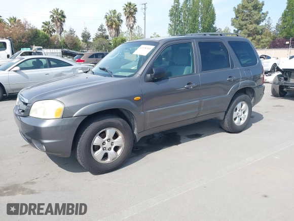 2003 Mazda Tribute LX with VIN 4F2YZ04193KM08890, listed as a IAAI auction lot 42158385 with 282,314 mi miles and . Bid and sale history available at carsss.com. Image 2.