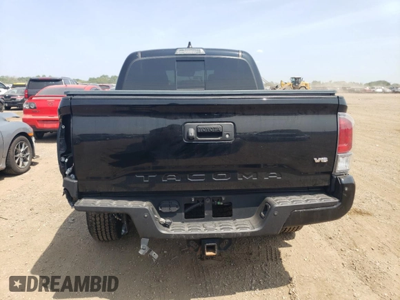 2021 Toyota Tacoma SR с VIN 3TMCZ5AN5MM417465, выставлен на аукционе Copart как лот 61266195 с пробегом 59 078 миль миль и Списание • Salvage title. История ставок и продаж доступна на DreamBid. Изображение 6.